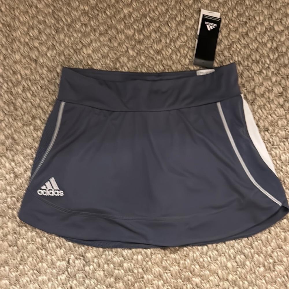 Adidas sport in tennis skirt.